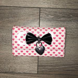 Pink patent leather-like wallet with hearts